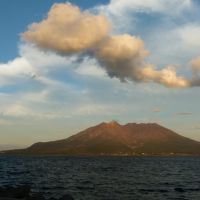 Kinko-wan Bay and Sakurajima Volcano complete with typhoon tail, Kagoshima, Каноя