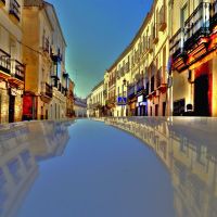Car reflection in Barrio Nuevo Street of Caceres downtown: Unesco`s  Heritage of Mankind, Ла-Линея