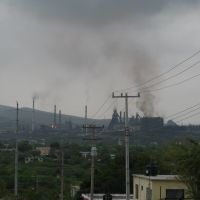 View to AHMSA steel factory with its black fumes, Монклова