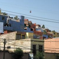 The Zacatecas cable car above houses, Закатекас