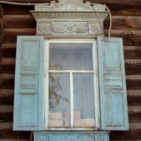 Wooden jambs and lintel of a window of house on Gogolya street, Минусинск