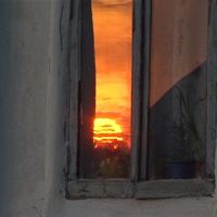Sunset in window of house on Lenina street, Елец