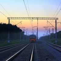 Electric train leaving in night, Востряково