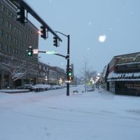 A snowy morning in downtown Casper, Wyoming. Viewing east on E. 2nd St., from its intersection with S. Wolcott St., Каспер