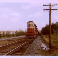 Coal train behind football field, Бакханнон