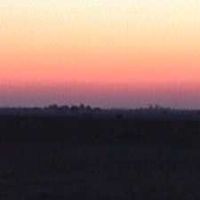Sunset, looking west from Champaign, Illinois, Бондвилл