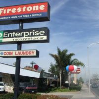 Firestone Enterprise Rent a Car and Coin Laundry (Street Signage), Коста-Меса