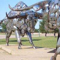 Two Steers  by John Kearney, also called Bumper Bulls, 2 life-size bulls made of vehicle bumpers, Kansas Coliseum, Wichita,KS, Кечи