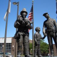 Protectors, Police Officer Firefighter Memorial, bronze of fireman with girl and boy looking up to police officer, Shawnee Safety Center, Shawnee,KS, Овербрук