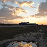 even mud puddles can be pretty at sunset, US 59 and MO 45, Missouri, Овербрук