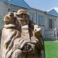 wise old wood sculpture in Wheat Ridge, Эджуотер