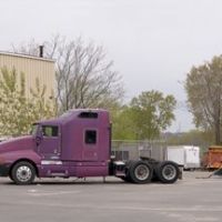 Two Purple Trucks, or Where There are Trailers... There Are Tractors, Малден