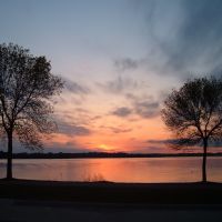 May 2005 - Plymouth, Minnesota. Pair of trees on the shore of Medicine Lake at sunset., Медисин-Лейк