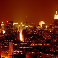 Looking up Manhattan from the west side, by night, Сиракус