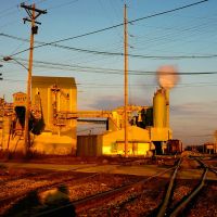 Carey, OH USA cement plant and railroad yard at sunset, Харрод