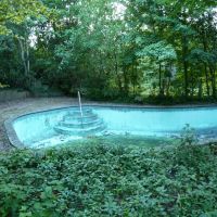 a warm summer evening, yet this long-abandoned swimming pool isnt open to anyone but mosquito larvae, 8-7-11, Чапел-Хилл