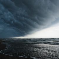 Storm front passes over Port Aransas beaches - Copyright 2010 by John C Karjanis, Одем