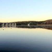 Tom Miller Dam and cattails on other side of Lake Austin, Austin, TX, Роллингвуд