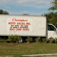 Christophers Auto Sales Sign on a Ford E350 Truck at Eagle Lake, FL, Игл-Лейк