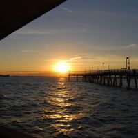 Sunsetting over Saraota featuring the city pier, Сарасота
