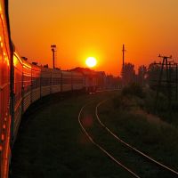 Ukraine - view on the sunrise from window of train, Токмак