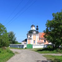 Korets. Polish Roman Catholic church from the village street., Корец