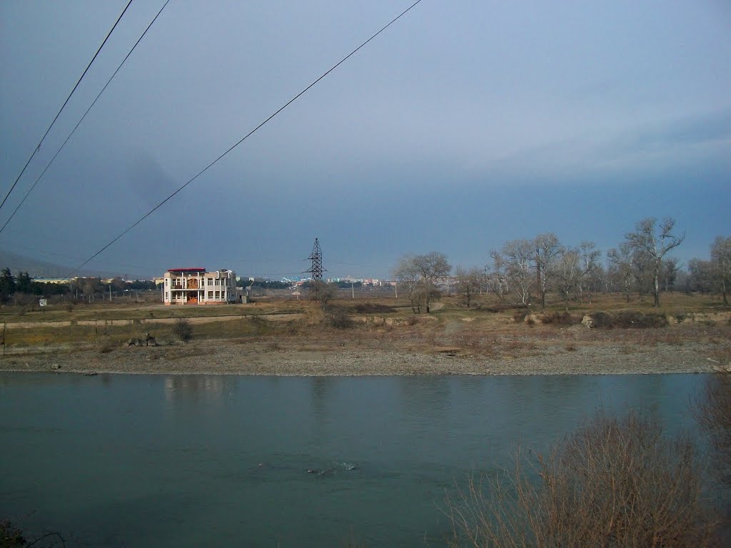 Standing over the waste water bypass channel to Mtkvari, Рустави