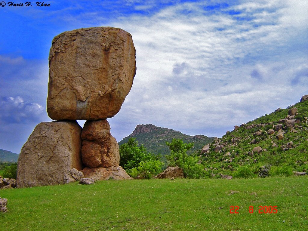 A Beautiful granitic Tor stands studded on a grass covered hill,near wailpally village., Куддапах