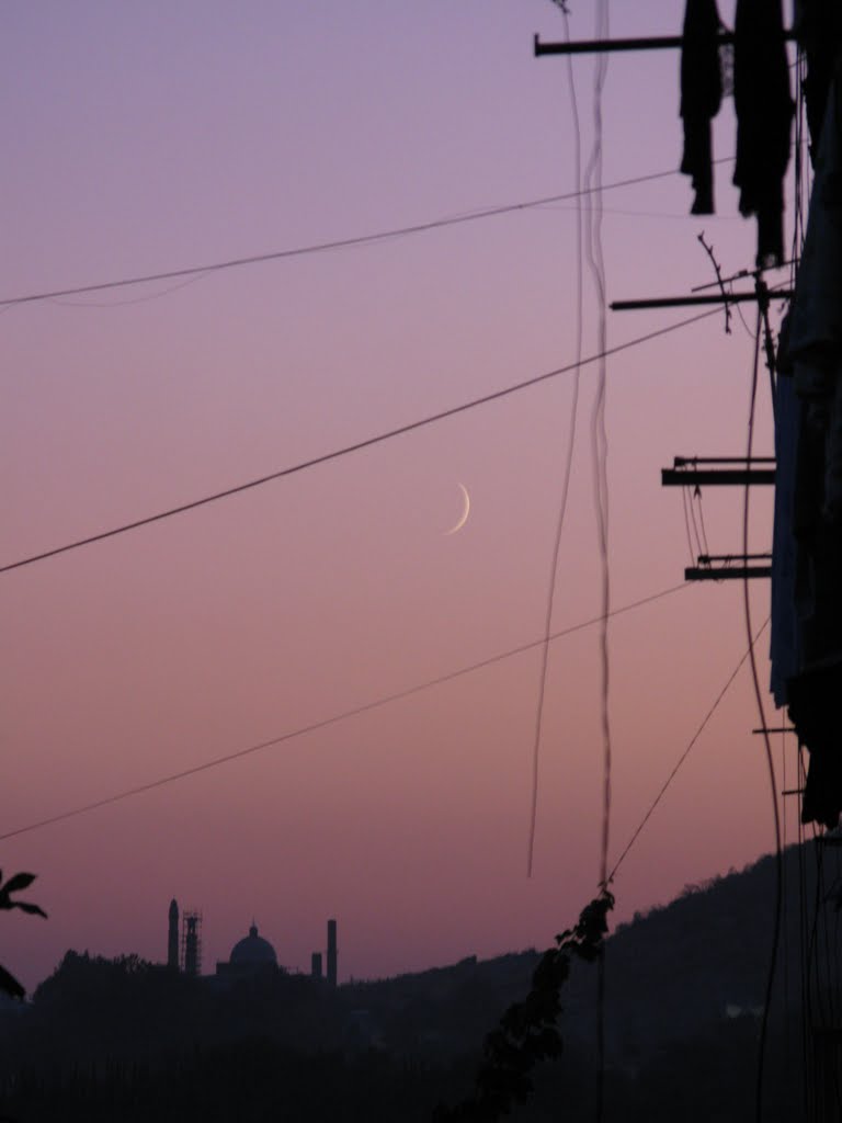 Osh, Masaliev street, view to mosque near Suleiman hill (zoom), sunset, Ош