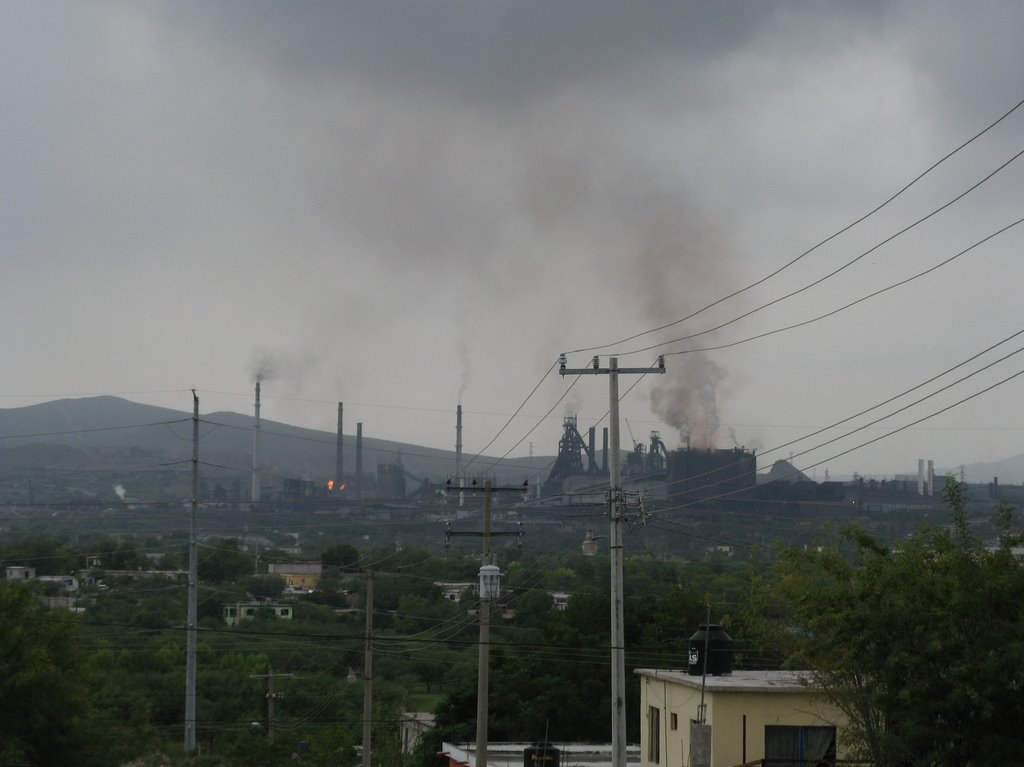 View to AHMSA steel factory with its black fumes, Монклова