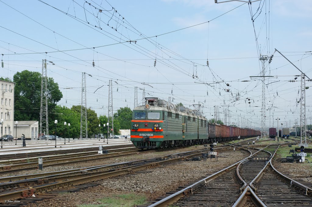 Electric locomotive VL80S-1808 with train on train station Bataysk, Батайск