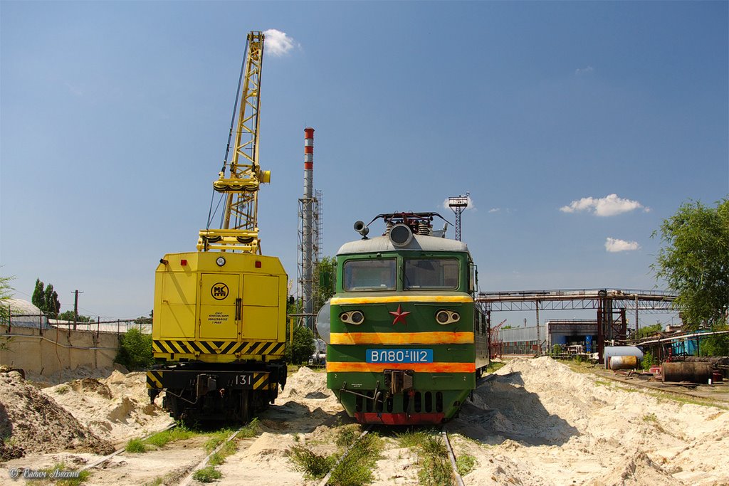 Electric locomotive VL80T-1112 with crane near depot of the train station Salsk, Сальск