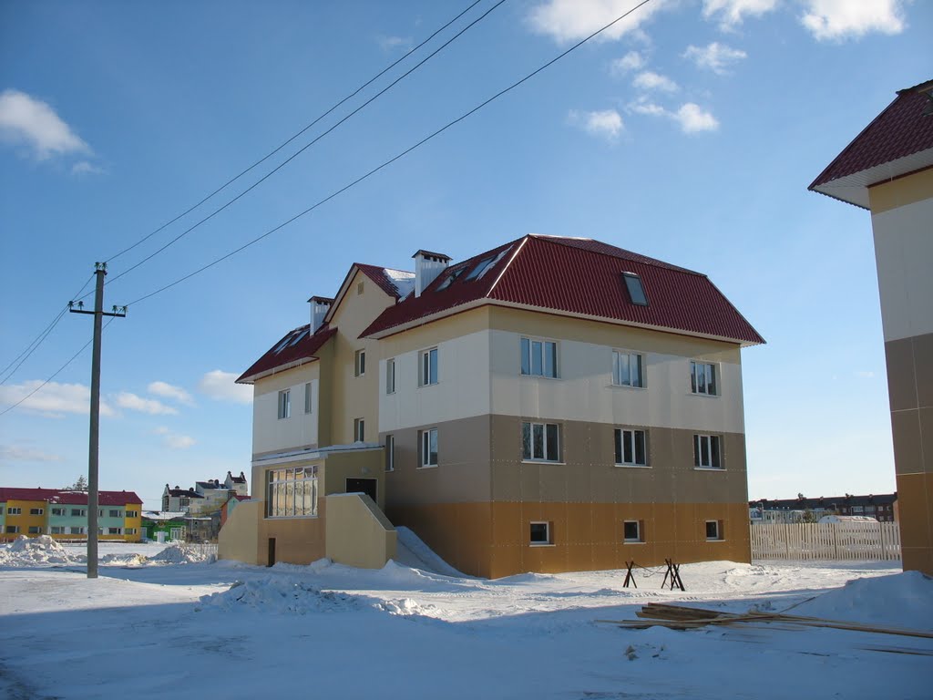 Новый дом в 1-ом микрорайоне, Губкинский