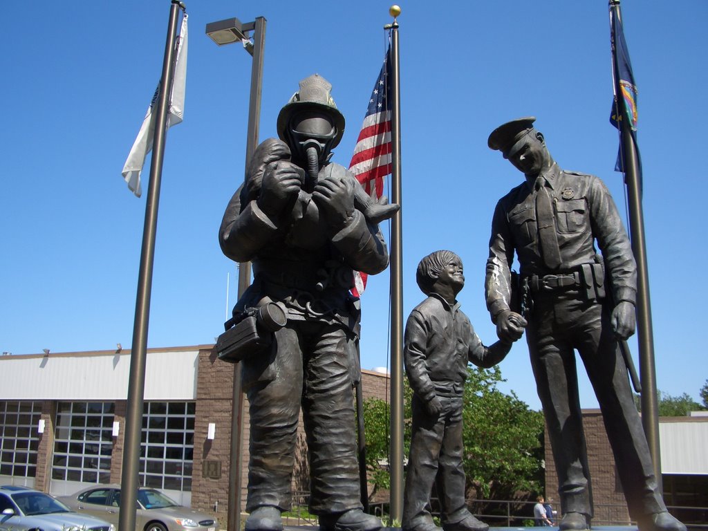 Protectors, Police Officer Firefighter Memorial, bronze of fireman with girl and boy looking up to police officer, Shawnee Safety Center, Shawnee,KS, Овербрук