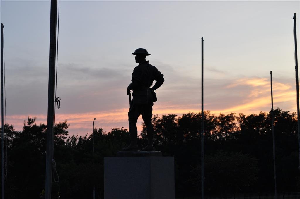 World War I bronze soldier against sunset, Olathe Memorial Cemetary, Olathe, KS, Овербрук