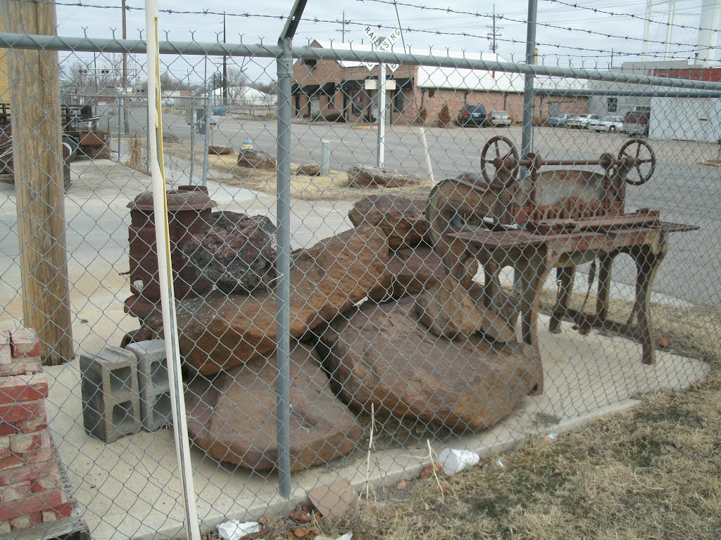 Antique machinery and rocks, from the south west. Salina Kansas, January 12, 2012, Салина