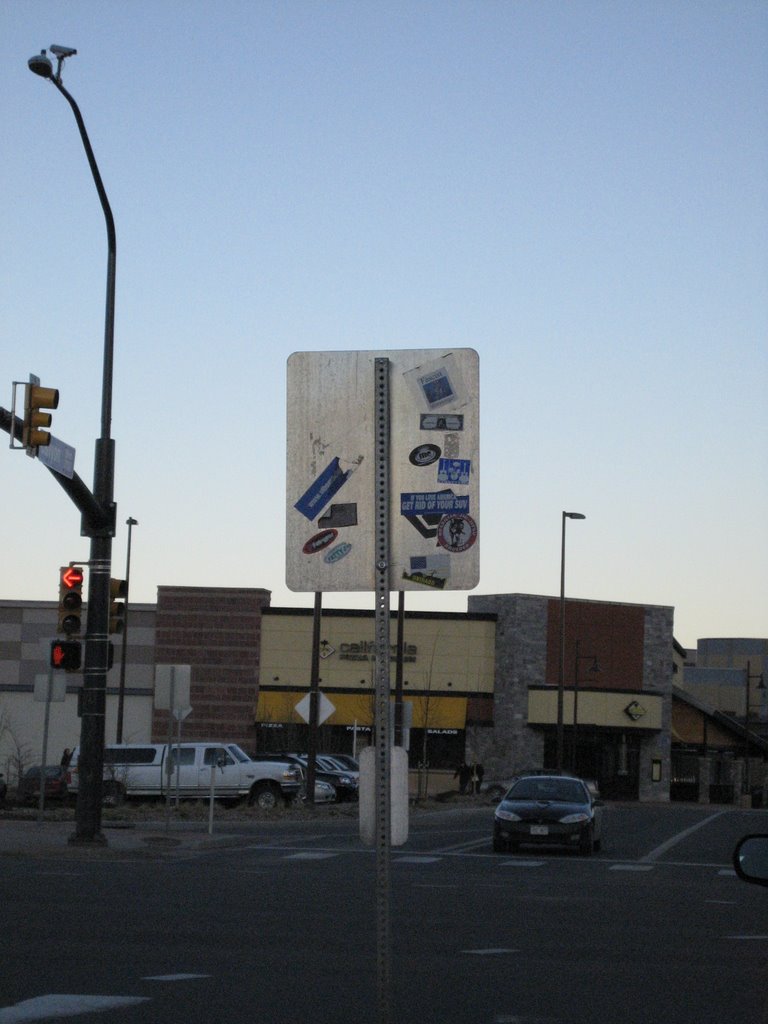 Sign at Canyon and 28th with stickers, Аурора
