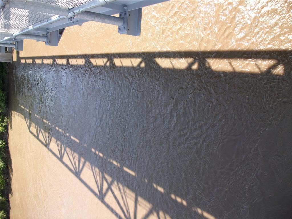 bridge shadows in the Missouri River south of viewing platform, Jefferson City, MO, Джефферсон-Сити