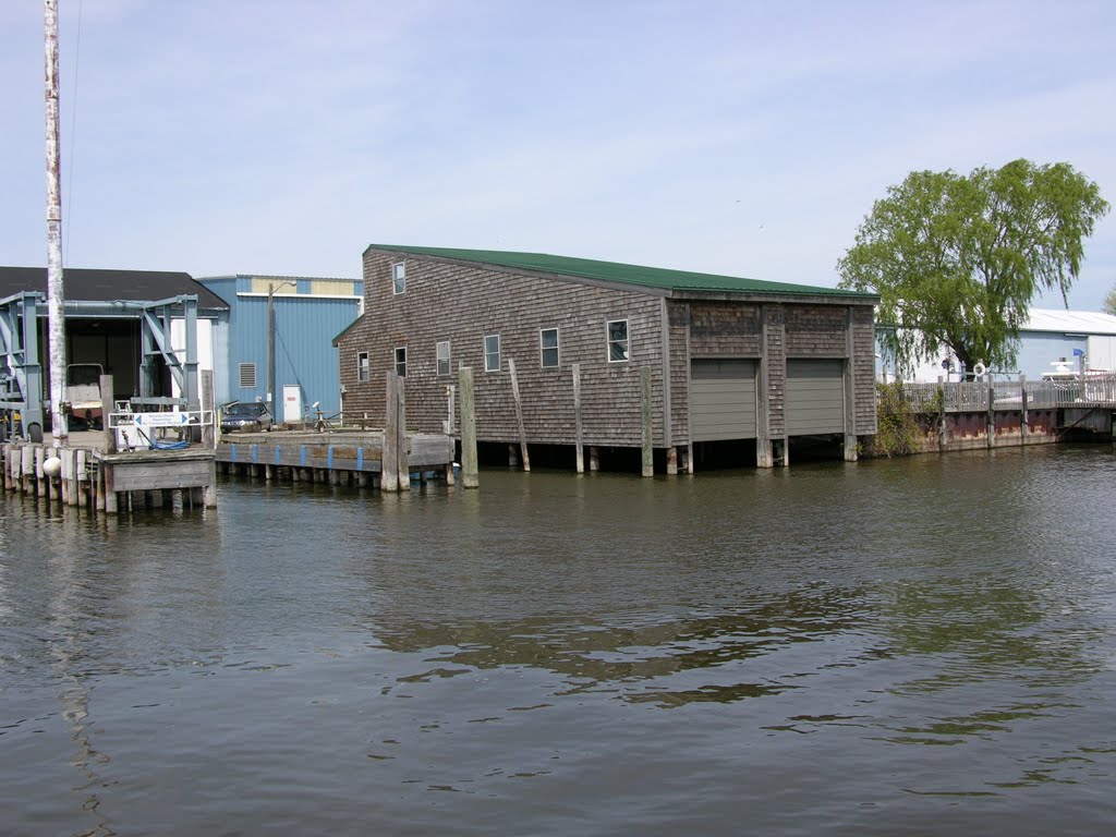 Boat house on Bear lake Channel. At Pointe Marine, Нортон Шорес