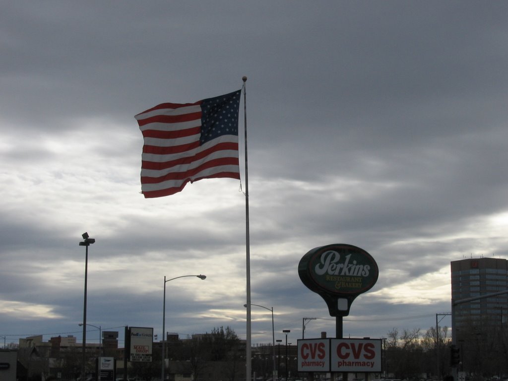The large American flag at Perkins Restaurant on N. 27th St., in Billings, Montana with an West Wind - Autumn, 10.26.09, Биллингс