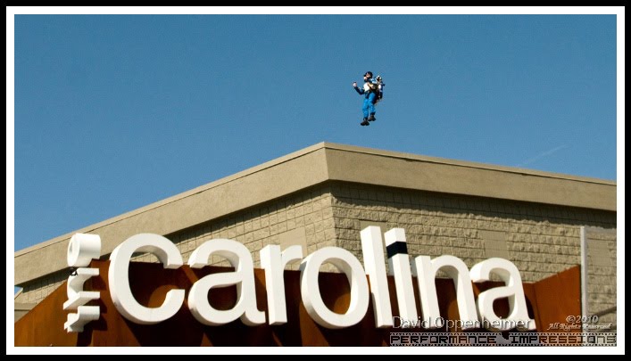 Rocketman Dan Schlund with Rocket Belt Jet Pack Flying Over Carolina Cinemas, Билтмор-Форест