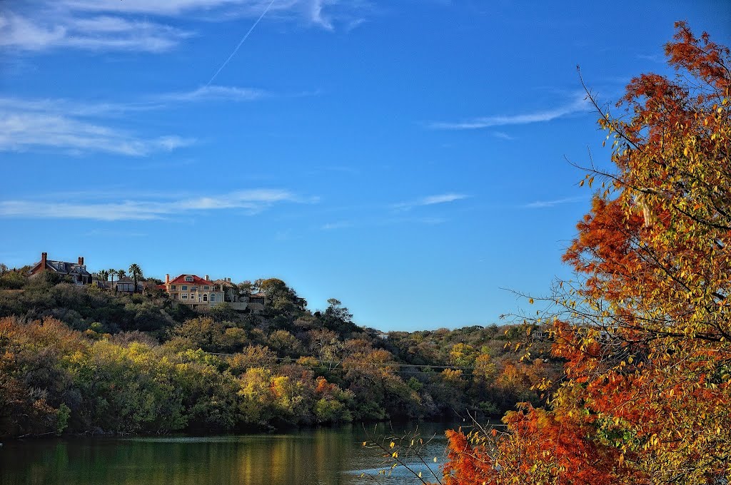 Homes on a Hillside. I wanted to capture the colors of the two side of the hillsides between Lady Bird Lake. Reds on the right and green & yellows on the left with blue skies above. It was this contrast of colors that struck me here., Роллингвуд