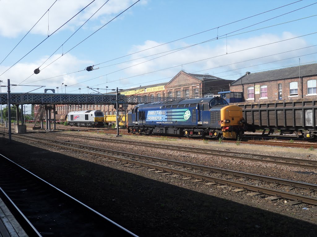 37423 and 67026 sit on the plant at doncaster, Донкастер