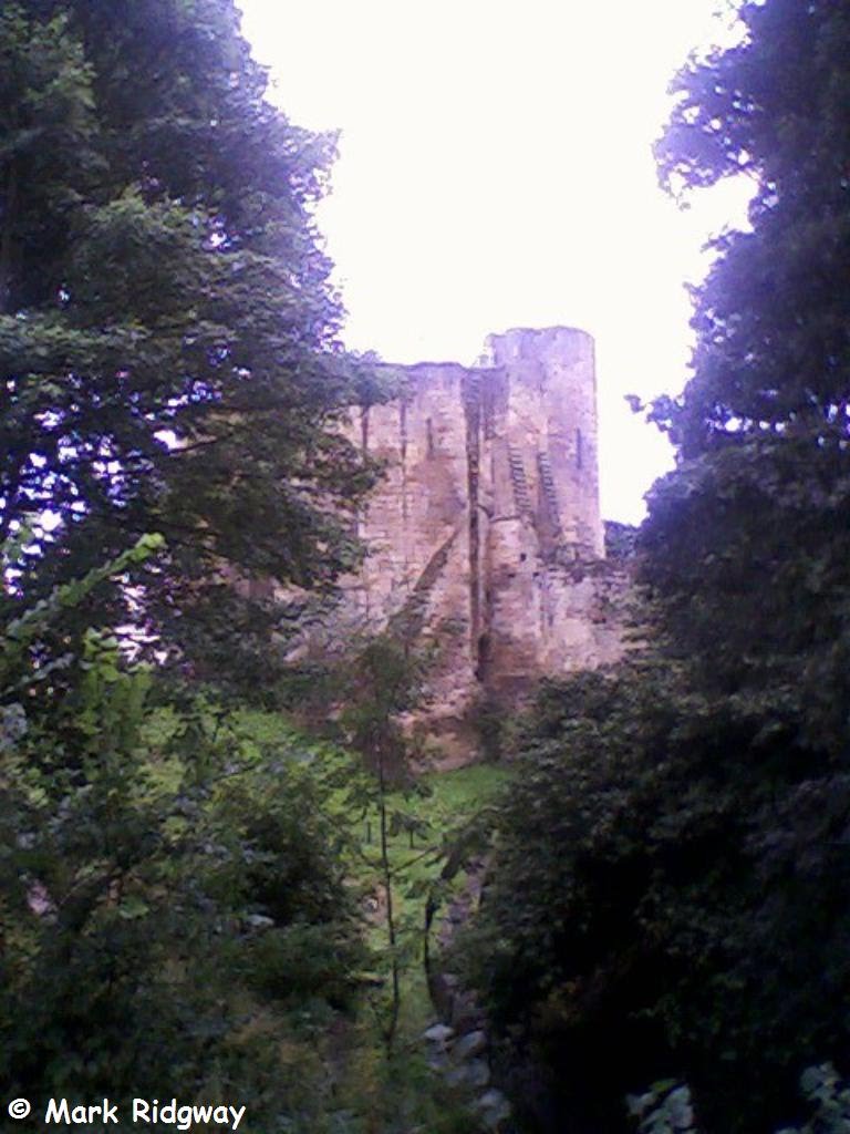 Tonbridge Castle viewed through trees, Тонбридж