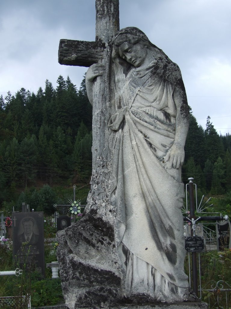 Статуя на кладбище, Сколе