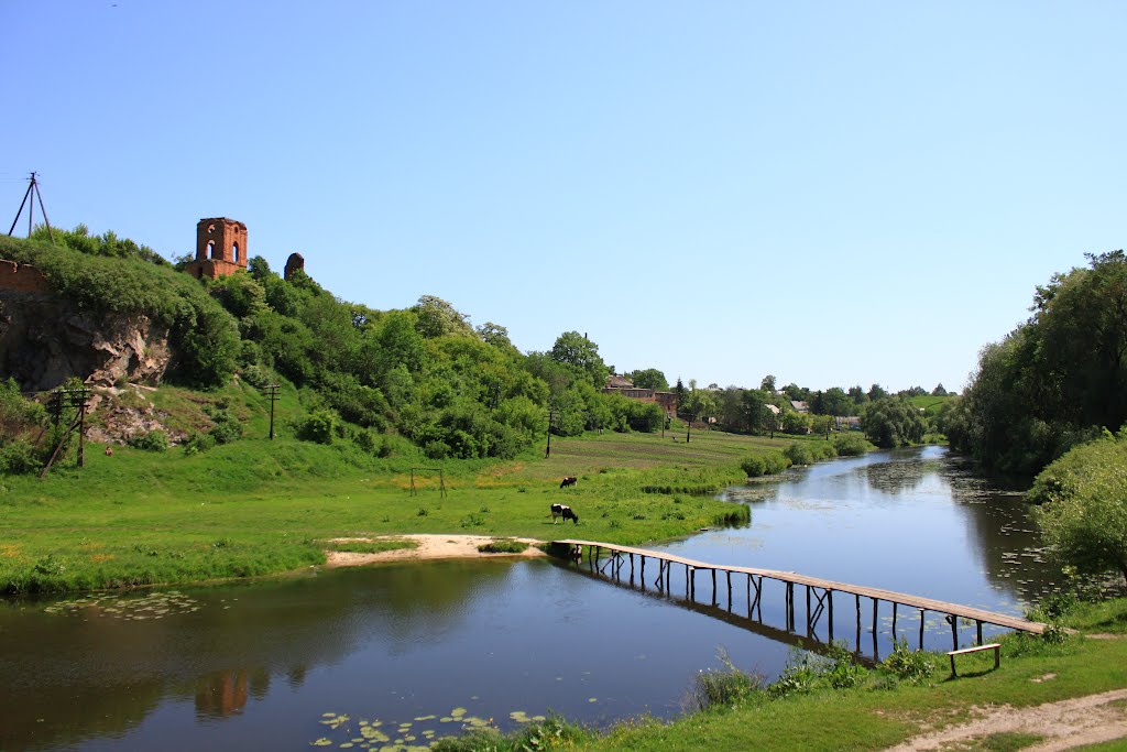 Korets castle. The view with the wooden bridge across the river Korchik., Корец